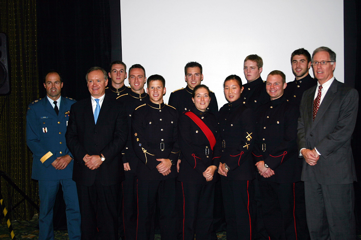 : RMC Commandant, BGen Tom Lawson & nine of the cadets studying Business Admin.  Larry Stevenson (L) and Jim Leech (R) 